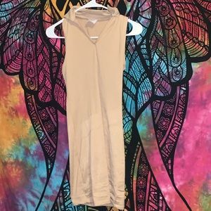 dress is a extra small, cream colored and comfortable and easy to dress up with